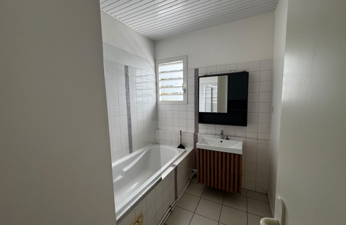 Spacieuse maison mitoyenne  3 chambres