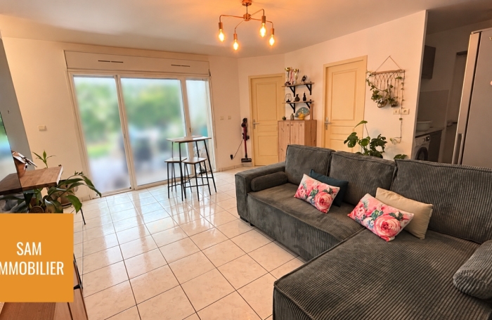 Appartement T3 en rez-de-jardin avec jardin privatif de 58m2 et 2 places de parkings
