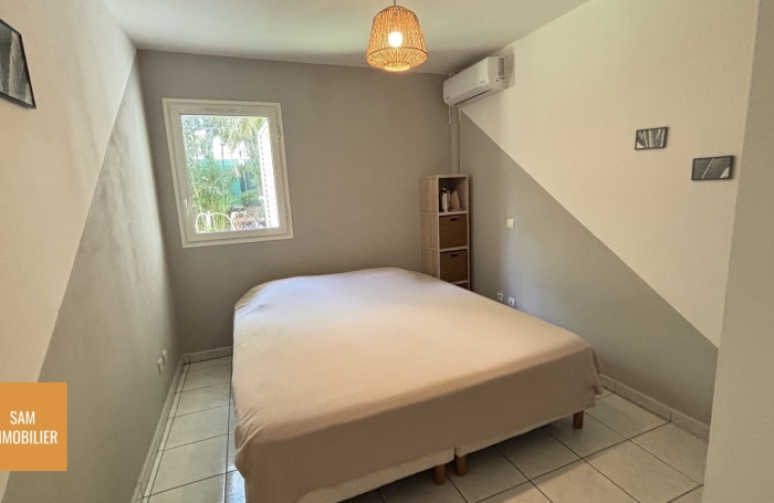 Appartement T3 en rez-de-jardin avec jardin privatif de 58m2 et 2 places de parkings
